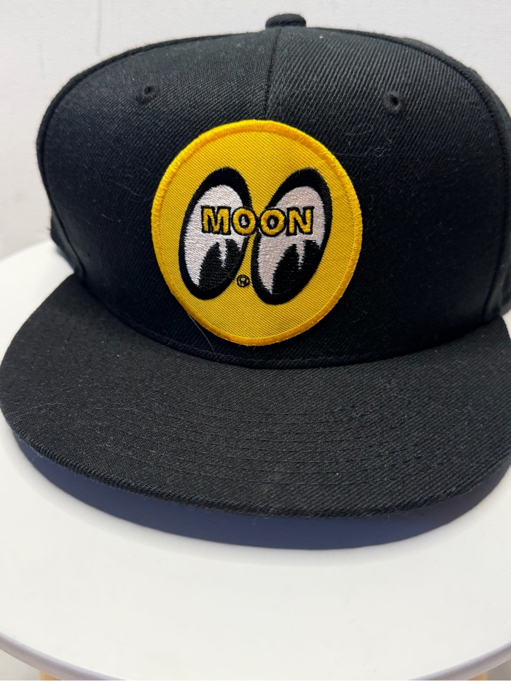 MOON Eyes Black Snapback Hat with Yellow Patch